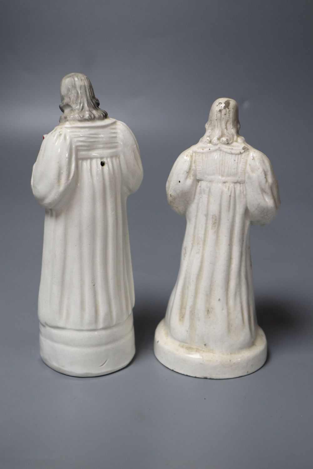 Two mid 19th century Staffordshire pottery figures of John Wesley (one a.f.)